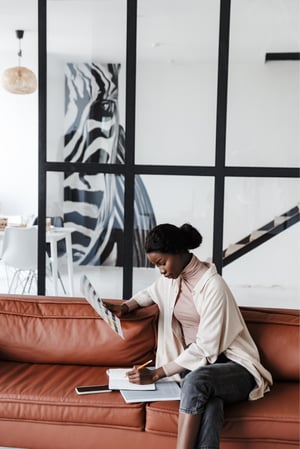 Interior Designer Doing Work on a Couch (1)